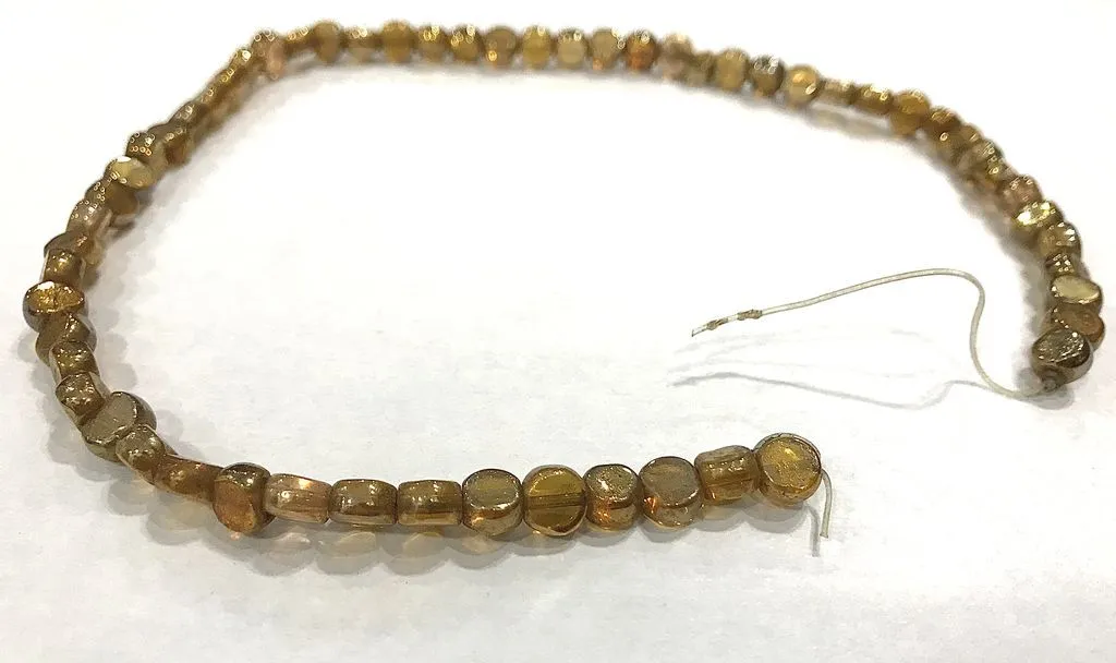 Light Golden Transparent Circular Glass Beads